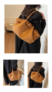 Détails du grand sac cabas en daim marron avec boucles latérales et finition vintage mat