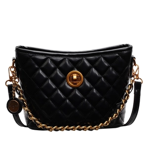 Classic black quilted bucket bag with golden chain strap and metallic twist lock closure