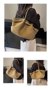 Détail du sac cabas en daim vert olive avec boucle métallique et texture mate élégante
