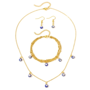 Golden stainless steel jewelry set featuring colorful evil eye charms for women