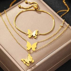 Double-layered butterfly necklace and adjustable bracelet set in polished gold stainless steel