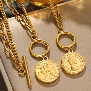 Vintage gold coin pendant necklace with layered chunky chain and OT buckle detail