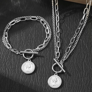 Detail of silver OT toggle clasp and vintage Queen Elizabeth II coin pendant jewelry set