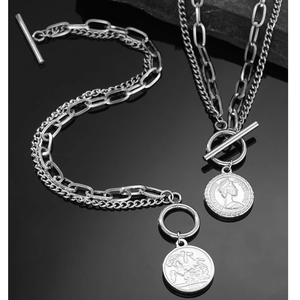 Detail of vintage silver OT toggle necklaces with Elizabeth II and 1901 coin pendants