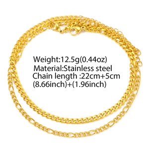 Detail of golden stainless steel Figaro and Cuban layered anklets with 22cm length