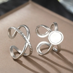 Minimalist silver-toned adjustable open rings with cross and circle disc designs