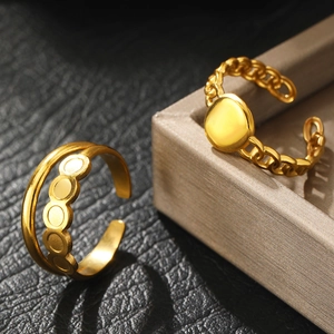 Vintage gold-plated double-layer open rings for women featuring minimalist circular hollow patterns