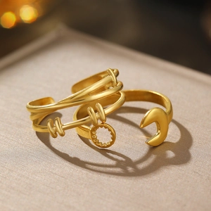 Golden stainless steel adjustable ring set with wrench design and layered gear elements