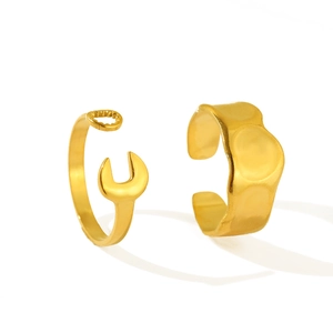 Set of two gold stainless steel open rings with wrench design and hammered texture details