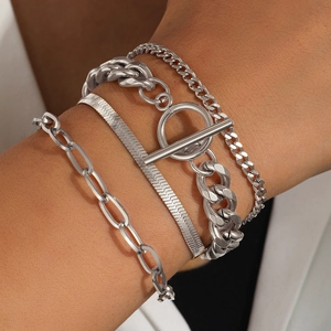 Detail view of 4-piece silver stainless steel layered bracelet set with OT toggle clasp