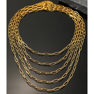 Polished gold paperclip chain necklace with five layered strands and lobster clasp