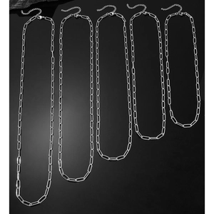 Close-up of silver paperclip chain necklaces in five lengths with lobster clasps
