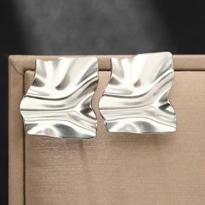 Modern irregular crumpled square stud earrings in polished silver stainless steel finish