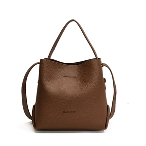 Dark brown lychee pattern bucket bag with wide top handle and minimalist brand logo
