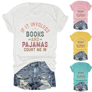 Close-up of graphic slogan t-shirt set in white, pink, yellow and cyan cotton fabric