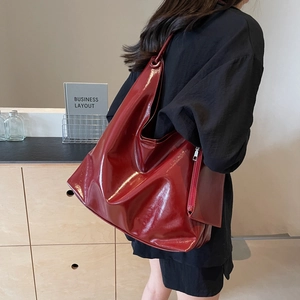 Minimalist deep red patent leather shoulder tote bag for office and casual style