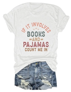 Detail view of white cotton T-shirt with vintage slogan and distressed blue denim shorts