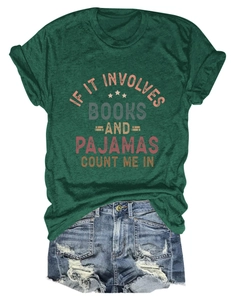 Detail of dark green cotton t-shirt with book slogan and ripped denim shorts set