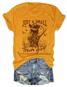 Detailed flat lay of mustard cotton t-shirt with retro graphic and denim shorts