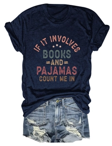 Flat lay of navy cotton T-shirt with 'If it involves books' slogan and denim shorts