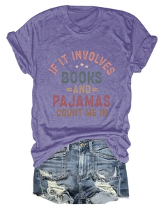 Detail of purple graphic tee with book-themed text and distressed denim shorts set