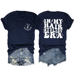 Front and back view of navy blue cotton T-shirt featuring In My Hair Stylist Era typography