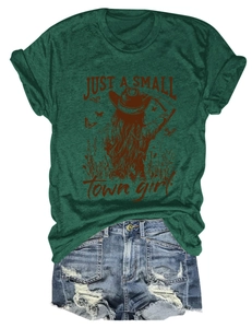 Detail of retro small town girl print on dark green cotton tee with denim shorts