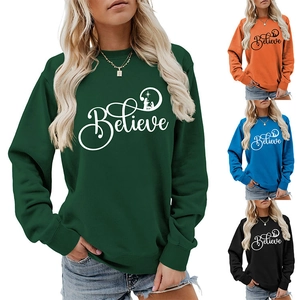 Detailed view of women's crewneck sweatshirt with Believe print and rib-knit cuffs
