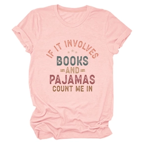 Detail of pink cotton T-shirt featuring vintage If It Involves Books And Pajamas slogan
