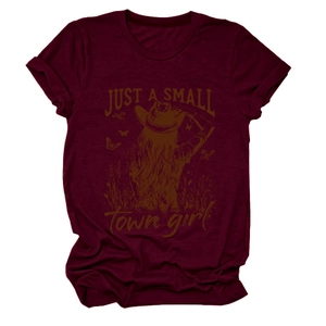Detailed flat lay of burgundy t-shirt with Just a Small Town Girl western graphic