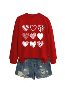 Close-up of red crewneck sweatshirt featuring nine unique love heart prints on front
