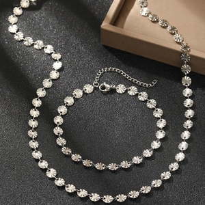 Minimalist silver stainless steel jewelry set with embossed disc necklace and bracelet