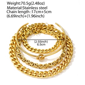 Detail of stainless steel jewelry set featuring chunky chains and a knotted bangle
