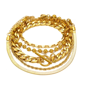 Golden multi-layer chain bracelet set with OT buckle featuring snake and cuban link designs