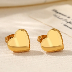 Elegant gold heart-shaped stud earrings with polished mirror finish for women