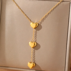 Elegant gold stainless steel Y-shaped necklace with three smooth heart-shaped pendants