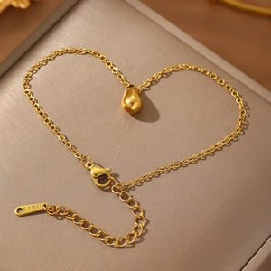 Minimalist 18k gold plated stainless steel bracelet with teardrop pendant in heart shape