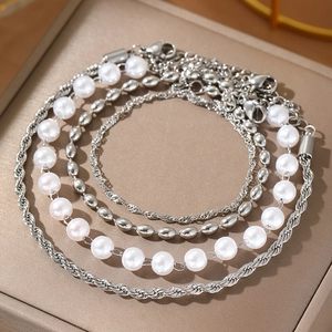 Bracciale multistrato vintage argento con perle finte e perline geometriche chic