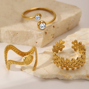 French style gold-plated titanium rings set featuring hollow heart and texture designs