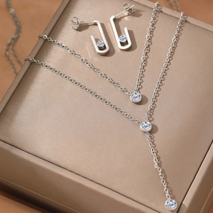 Elegant silver stainless steel jewelry set with Y-shaped necklace and rectangular earrings