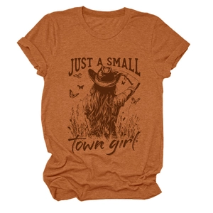 Detail of rust red T-shirt featuring girl in cowboy hat and Small Town Girl text print