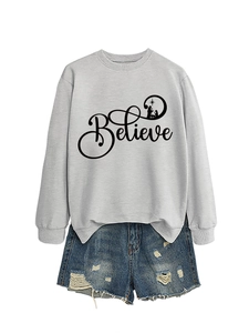 Detailed flat lay of a grey Believe crewneck sweatshirt and distressed blue denim shorts