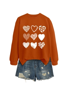 Detail of a crewneck sweatshirt with nine heart patterns and love text in white print