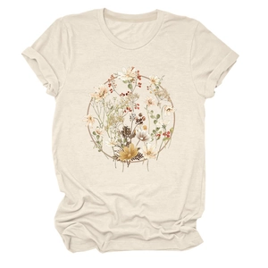 Close-up of vintage circular floral wreath print on beige short sleeve t-shirt