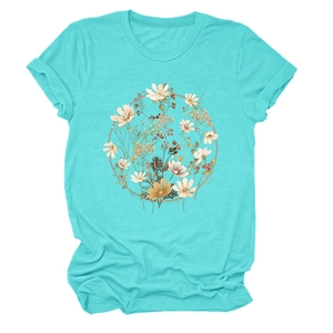 Close-up of a floral wreath art print on a teal round neck short sleeve T-shirt