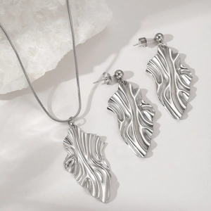 Silver stainless steel jewelry set with textured leaf pendants and snake chain necklace