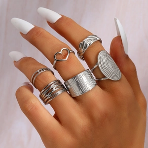 Bohemian style 6-piece silver stackable ring set with heart and textured designs
