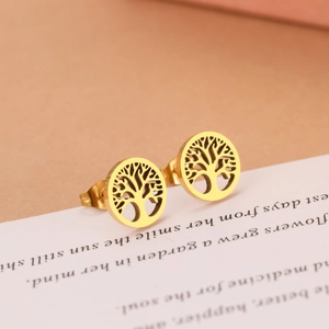 Golden titanium steel life tree round stud earrings on a vintage poem card background
