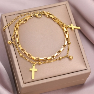 18K gold plated double layer cross bracelet featuring paperclip link and bead chain