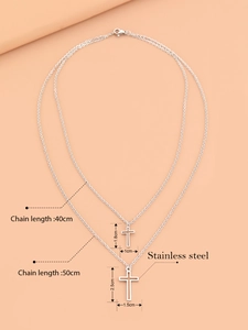 Detail view of double-layer stainless steel cross necklace with size measurements